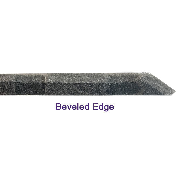 Beveled edge for carpet tiles creates transition for floor